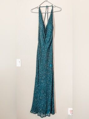Sleeveless Teal Sequin Evening Gown with Plunging Neckline